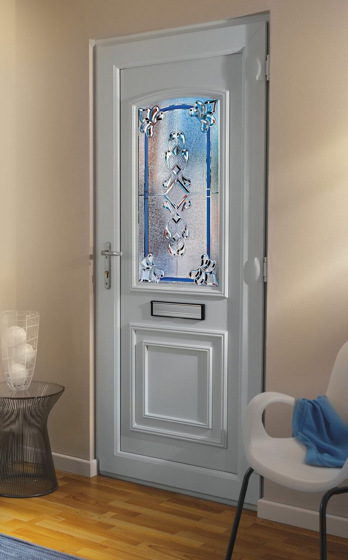 White uPVC front door with chrome furniture